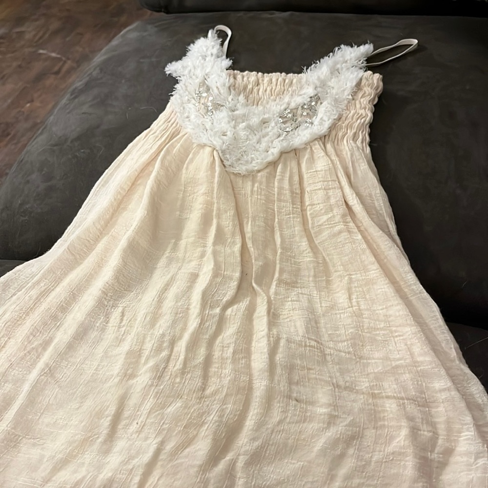 Could be used as a long shirt or a mini dress